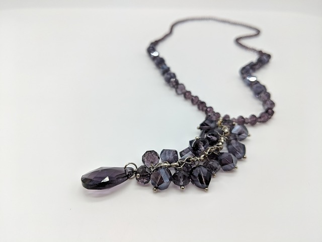 beaded necklace detail workspace